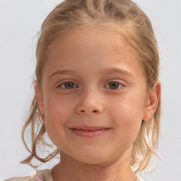 Joyful white child female with medium  brown hair and grey eyes