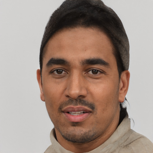 Neutral latino young-adult male with short  black hair and brown eyes
