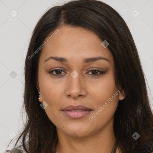 Joyful latino young-adult female with long  brown hair and brown eyes