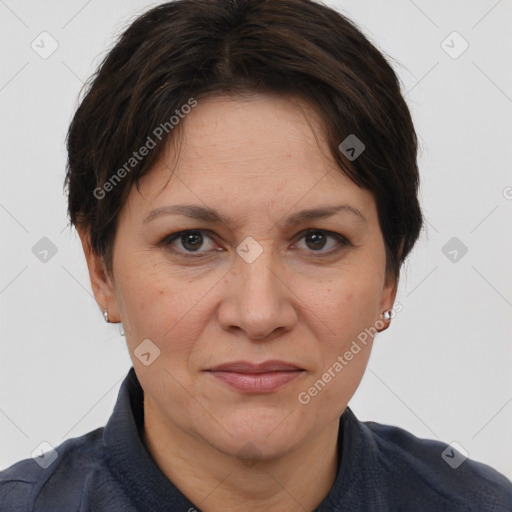 Joyful white adult female with short  brown hair and brown eyes