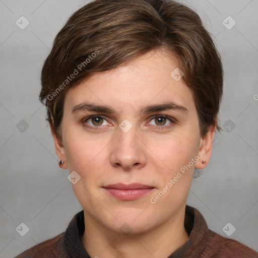 Joyful white young-adult female with short  brown hair and grey eyes