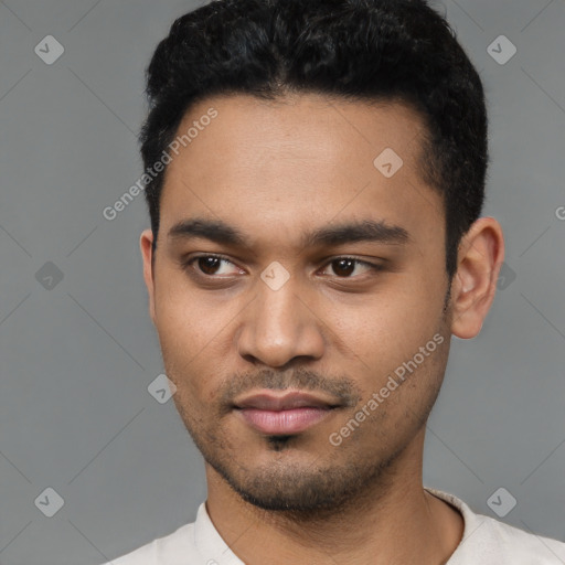 Neutral latino young-adult male with short  black hair and brown eyes