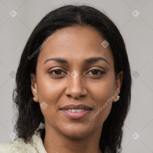 Joyful latino young-adult female with medium  brown hair and brown eyes