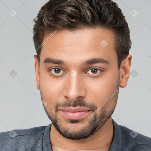 Neutral white young-adult male with short  brown hair and brown eyes