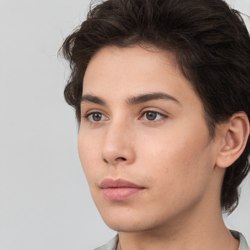 Neutral white young-adult male with medium  brown hair and brown eyes