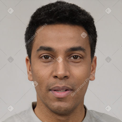 Neutral latino young-adult male with short  black hair and brown eyes