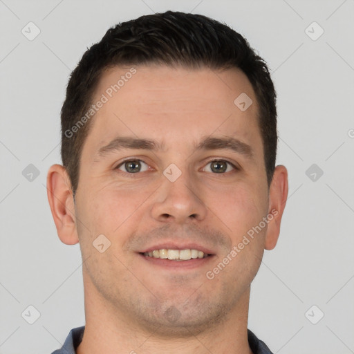 Joyful white young-adult male with short  brown hair and brown eyes