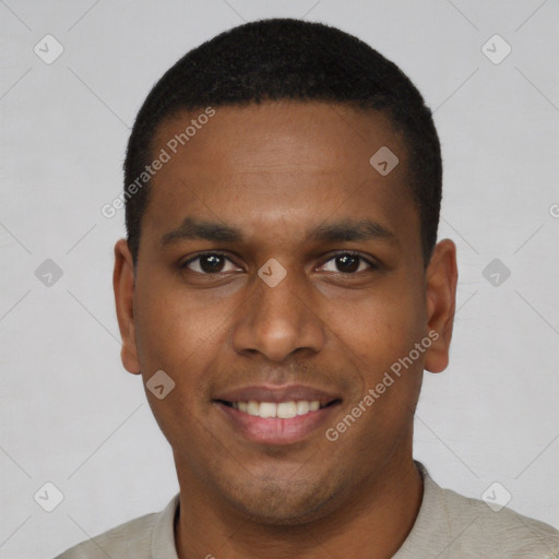Joyful black young-adult male with short  black hair and brown eyes