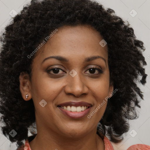 Joyful black young-adult female with medium  brown hair and brown eyes