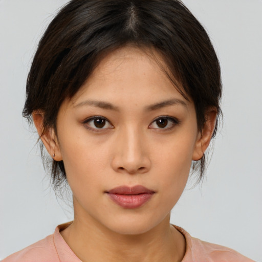 Neutral asian young-adult female with medium  brown hair and brown eyes