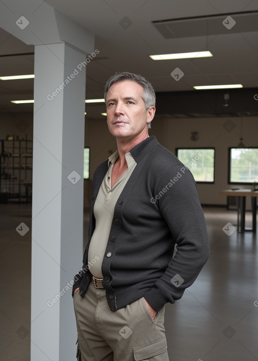 Irish middle-aged male with  black hair