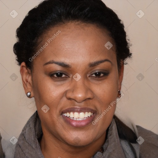 Joyful black adult female with short  brown hair and brown eyes