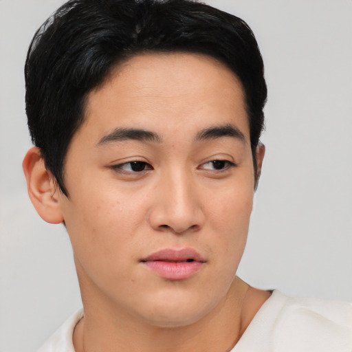 Neutral asian young-adult male with short  black hair and brown eyes