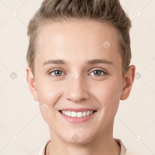 Joyful white young-adult female with short  brown hair and grey eyes