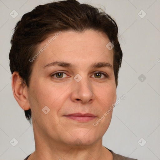 Joyful white adult female with short  brown hair and grey eyes