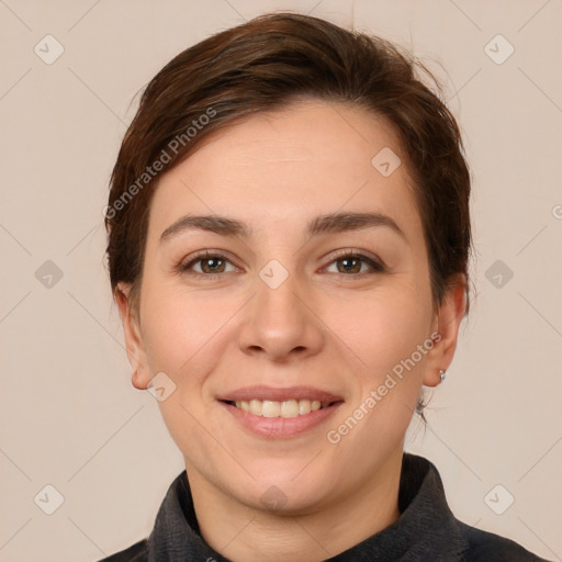 Joyful white young-adult female with short  brown hair and brown eyes