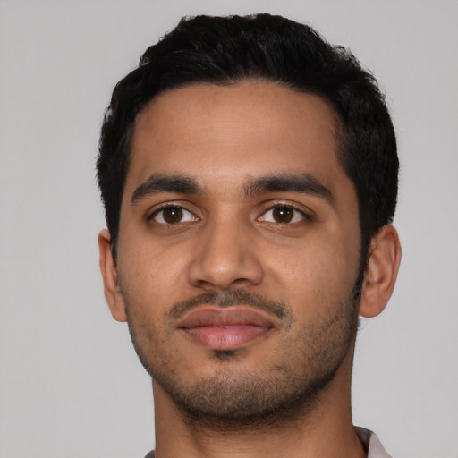 Neutral latino young-adult male with short  black hair and brown eyes