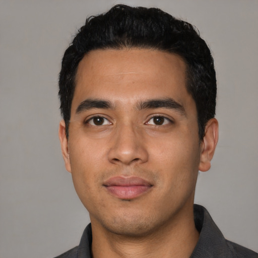 Neutral latino young-adult male with short  black hair and brown eyes