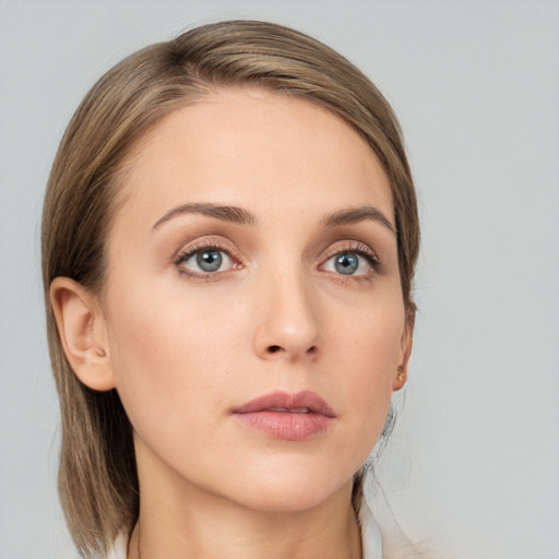 Neutral white young-adult female with medium  brown hair and grey eyes