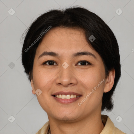 Joyful asian young-adult female with short  brown hair and brown eyes