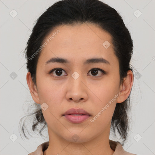 Neutral asian young-adult female with medium  brown hair and brown eyes