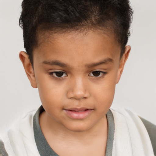 Joyful white child female with short  brown hair and brown eyes