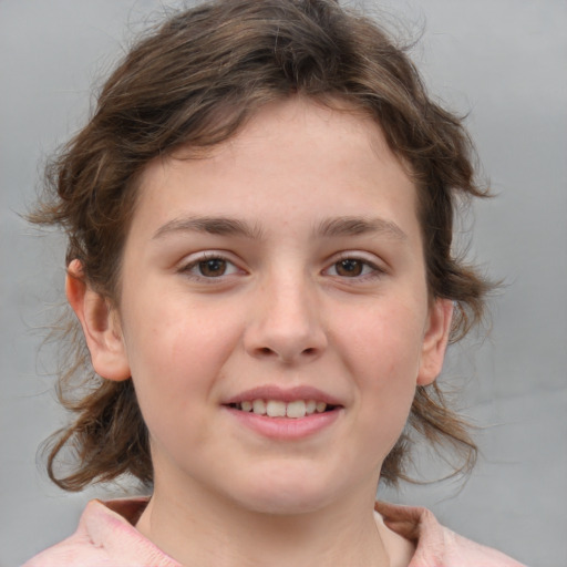 Joyful white child female with medium  brown hair and brown eyes