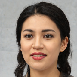 Joyful asian young-adult female with medium  black hair and brown eyes