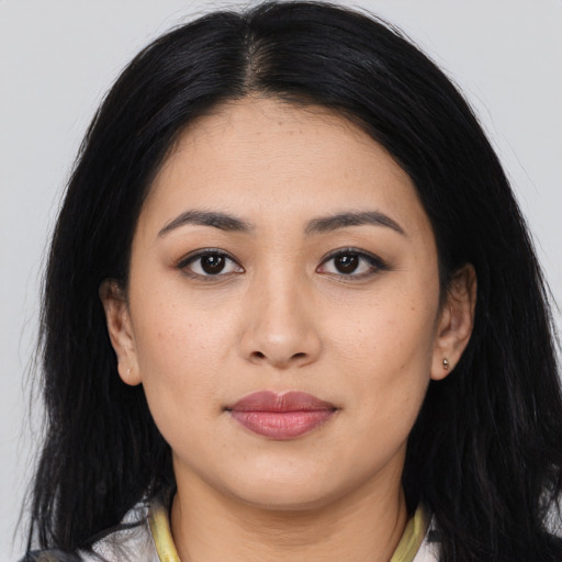 Neutral latino young-adult female with long  black hair and brown eyes