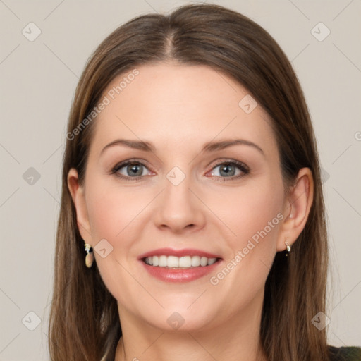 Joyful white young-adult female with long  brown hair and grey eyes