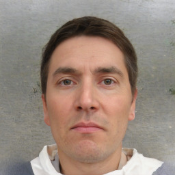 Neutral white adult male with short  brown hair and brown eyes