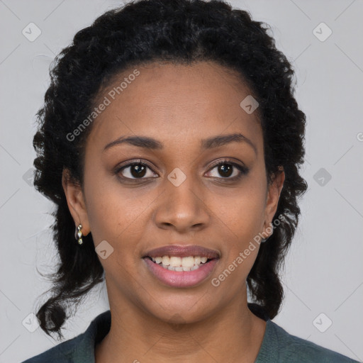 Joyful black young-adult female with long  brown hair and brown eyes