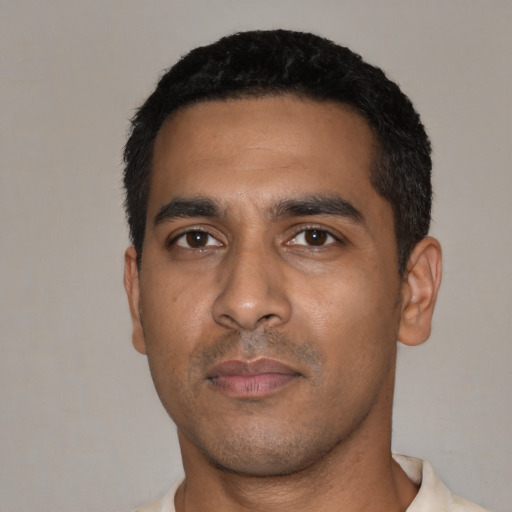 Neutral latino young-adult male with short  black hair and brown eyes