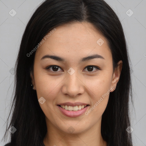 Joyful asian young-adult female with long  brown hair and brown eyes