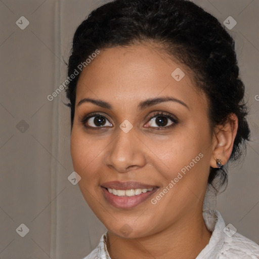 Joyful latino young-adult female with medium  brown hair and brown eyes