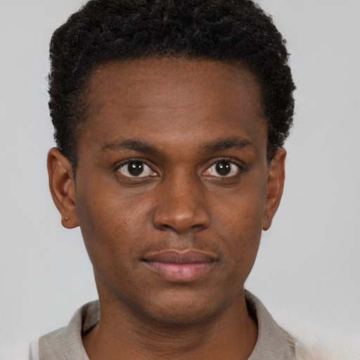 Neutral black young-adult male with short  brown hair and brown eyes
