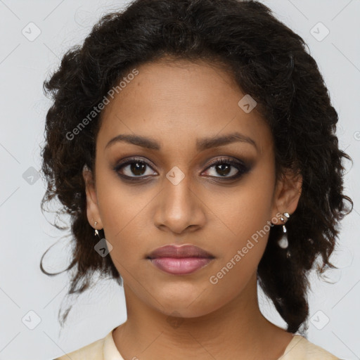 Joyful black young-adult female with medium  brown hair and brown eyes