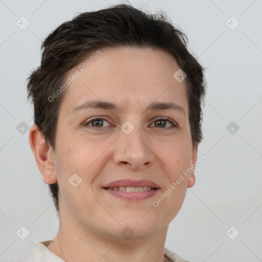 Joyful white adult female with short  brown hair and brown eyes