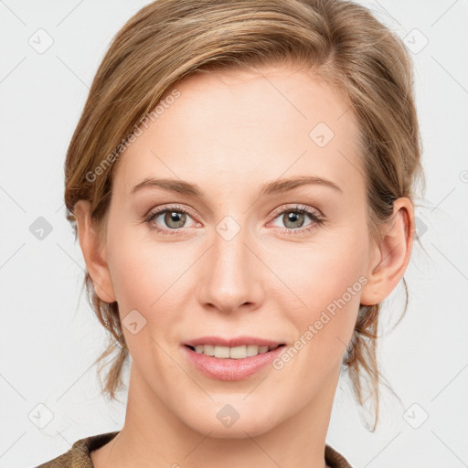 Joyful white young-adult female with medium  brown hair and blue eyes