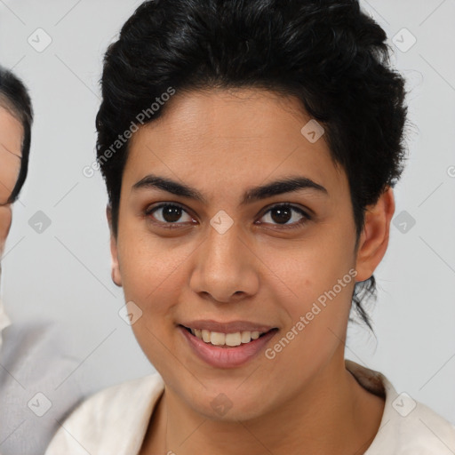 Joyful asian young-adult female with short  brown hair and brown eyes