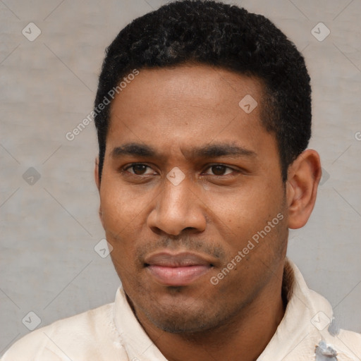 Neutral latino young-adult male with short  black hair and brown eyes