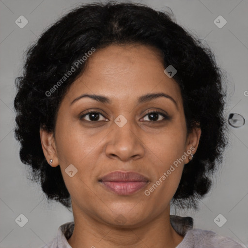 Joyful latino adult female with medium  brown hair and brown eyes