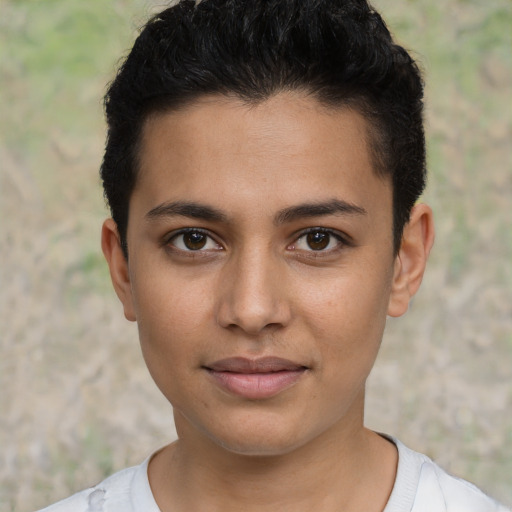 Joyful latino young-adult female with short  brown hair and brown eyes