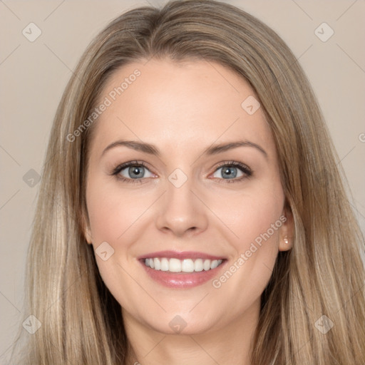 Joyful white young-adult female with long  brown hair and grey eyes