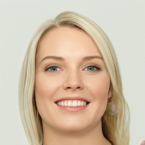 Joyful white young-adult female with long  brown hair and blue eyes