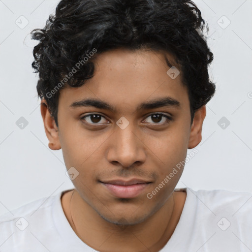 Joyful latino young-adult male with short  brown hair and brown eyes