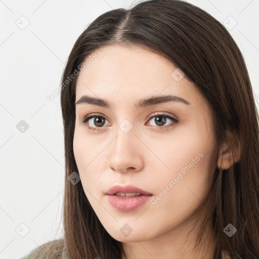 Neutral white young-adult female with long  brown hair and brown eyes