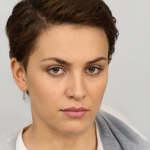 Neutral white young-adult female with short  brown hair and brown eyes