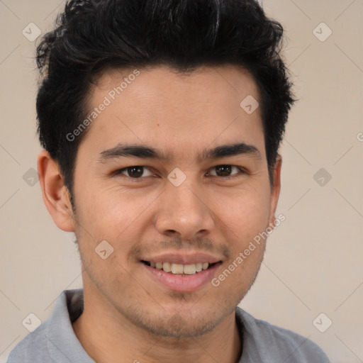 Joyful latino young-adult male with short  brown hair and brown eyes