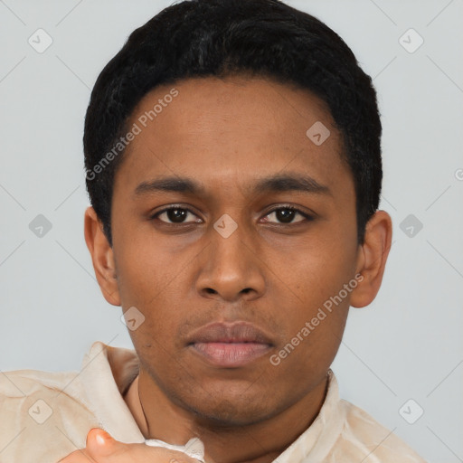 Neutral latino young-adult male with short  black hair and brown eyes
